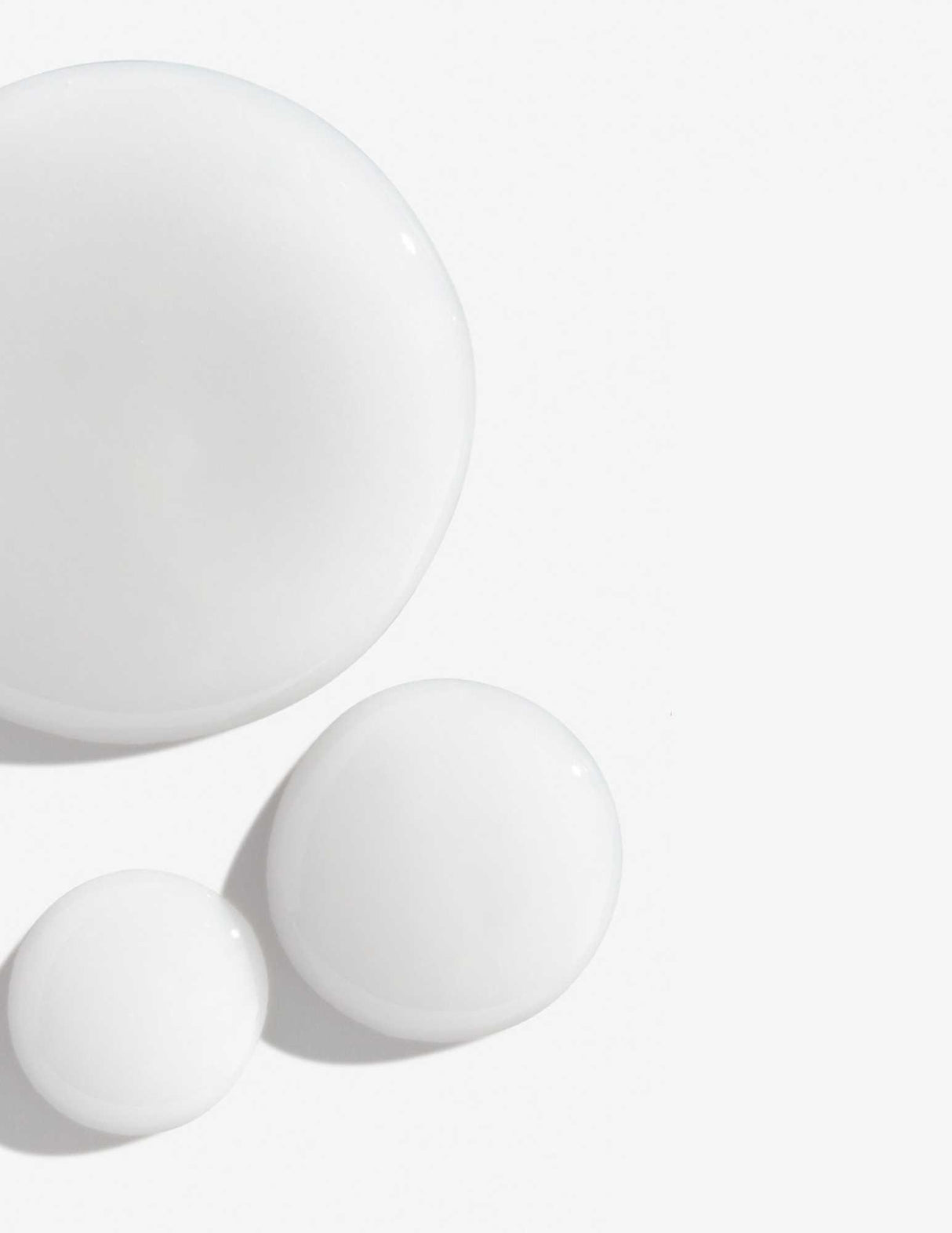 Texture of Redken Color Extend Shampoo demonstrating creamy formulation for color-treated hair protection.