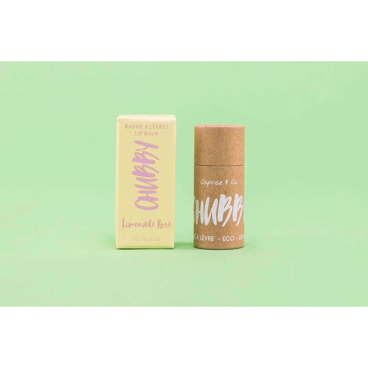 Compostable vegan lip balm in eco-friendly packaging with organic ingredients, shown on a green background, ideal for smooth, hydrated lips.