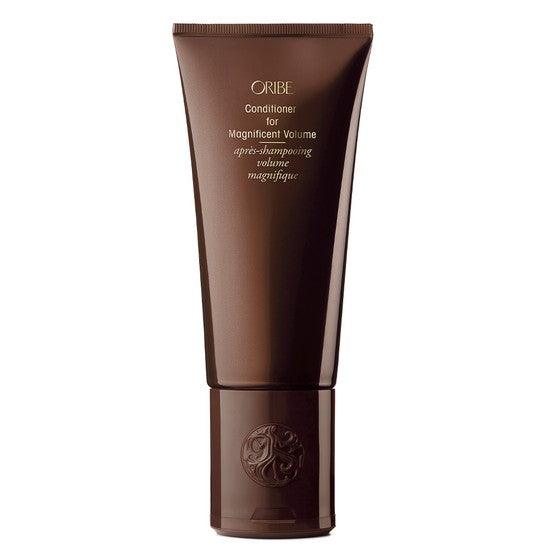 Oribe Conditioner for Magnificent Volume bottle for lightweight, voluminous hair care.
