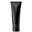 Oribe Crème For Style hair styling cream in black tube for frizz control and flexible hold, suitable for curly and straight hair.