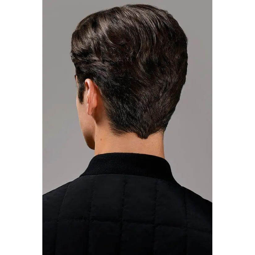 Back view of a person with styled smooth hair using Crème For Style cream, showcasing flexible hold and frizz control.