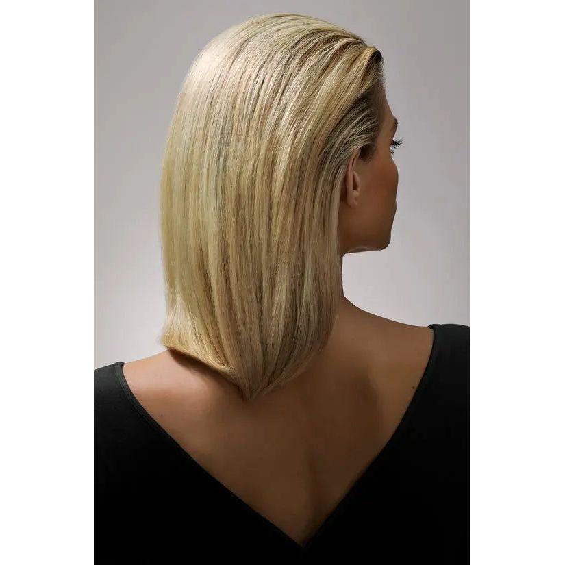 Back view of styled blonde hair using Crème For Style, showcasing shine and smoothness.