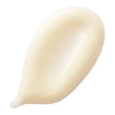 Swirl of Kérastase Crème UV Sublime hair cream for UV protection and heat styling care.