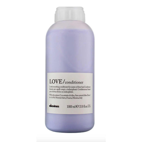 Davines Essential Haircare LOVE Smoothing Conditioner 1000ml bottle – anti-frizz formula for smooth, shiny, elastic hair.