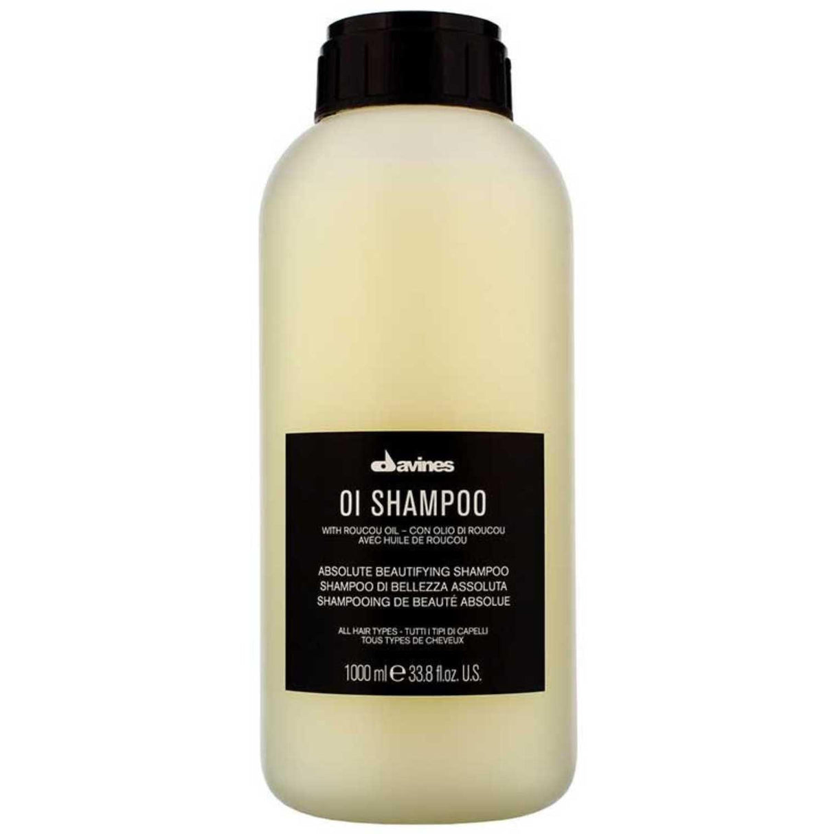 Davines Essential Haircare OI Shampoo Liter bottle with nourishing Roucou oil for soft, shiny hair and long-lasting fragrance.