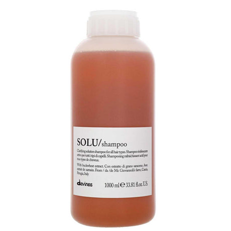 Davines Essential Haircare SOLU Shampoo Liter - 1000ml bottle for removing styling residue and promoting soft, shiny hair.
