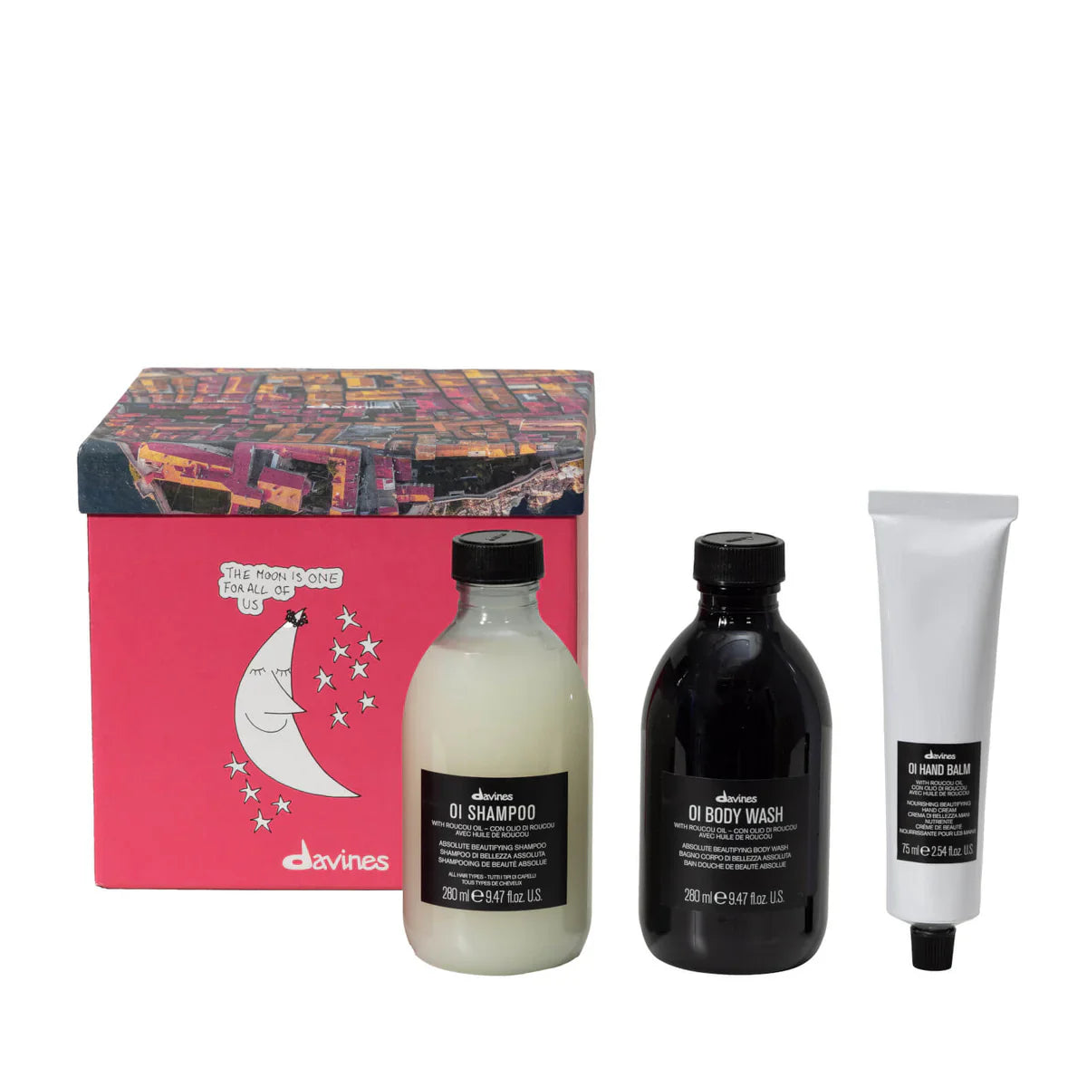 Davines OI Lifestyle Gift Set with OI Shampoo, OI Body Wash, and OI Hand Balm for comprehensive hair and body care.