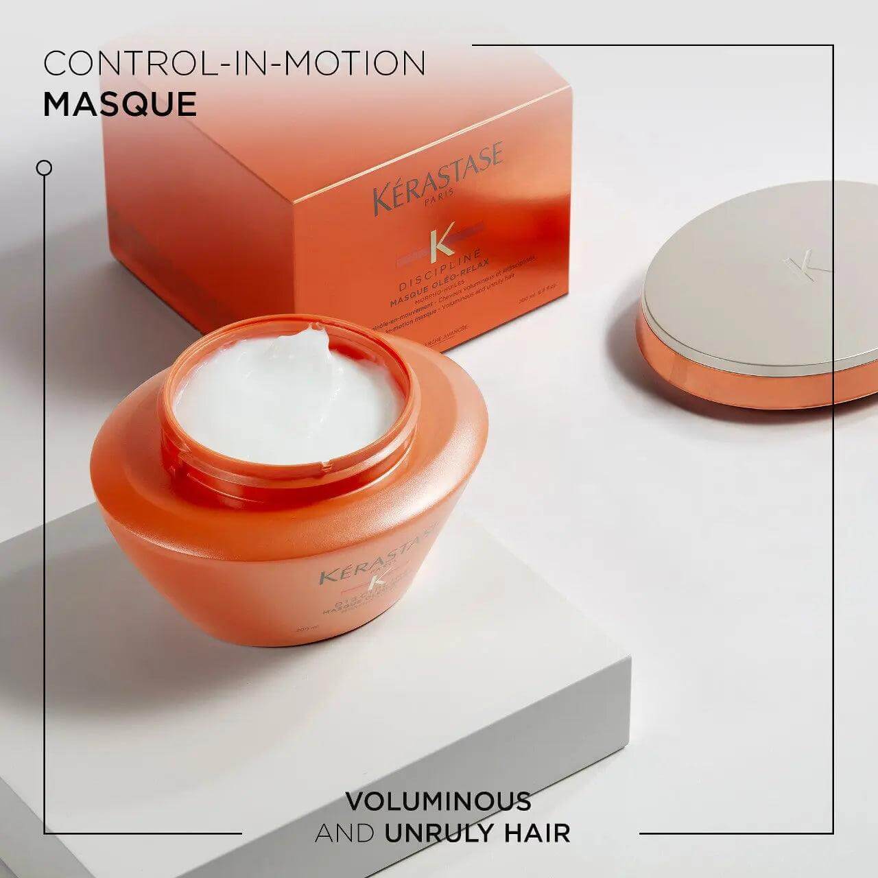Kerastase Discipline Masque Oléo-Relax Mask for frizz control and deep conditioning on display with box and lid.