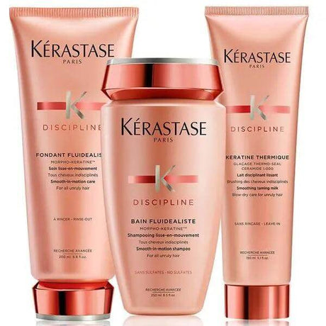 Kerastase Discipline Unruly Hair Set with shampoo, conditioner, and heat protector for smooth, frizz-free hair care.