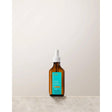 Moroccanoil Dry-No-More Professional Scalp Treatment bottle with natural ingredients for dry scalp repair and hydration.