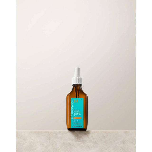 Moroccanoil Dry-No-More Professional Scalp Treatment bottle with natural ingredients for dry scalp repair and hydration.