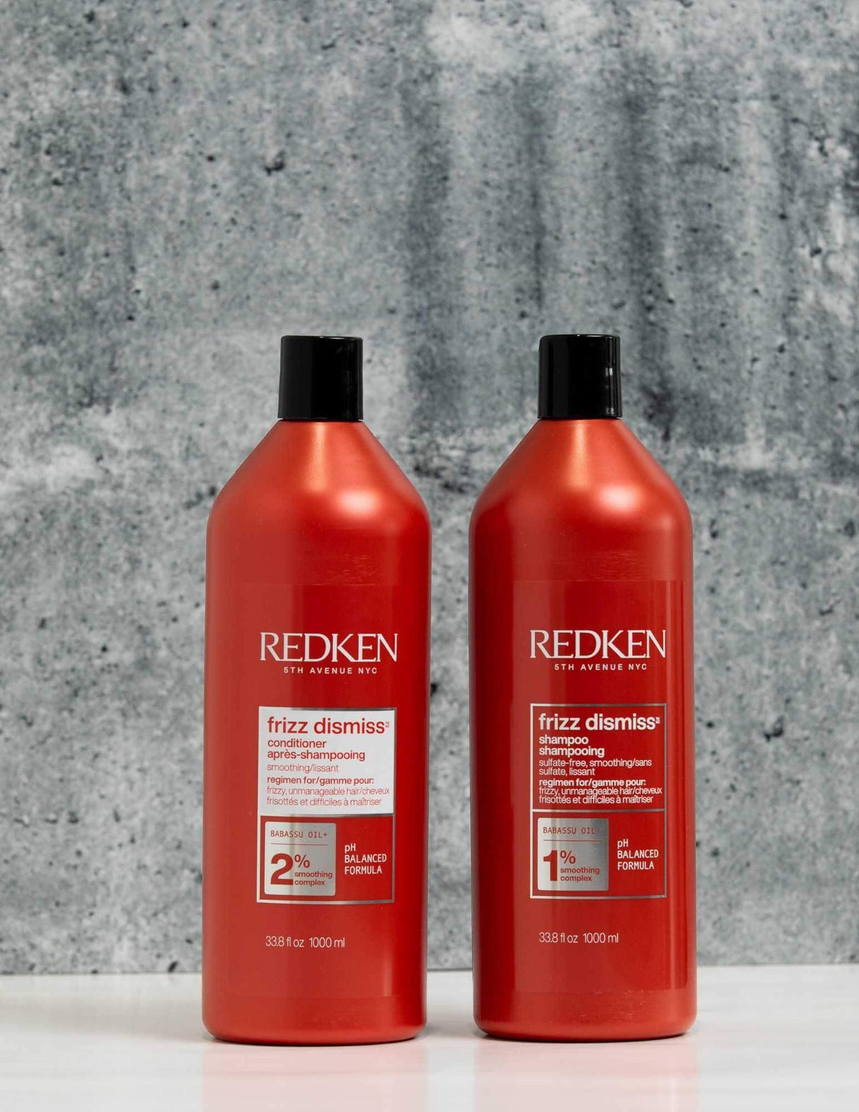 Redken Duo Liters Frizz Dismiss Shampoo & Conditioner for smooth, frizz-free hair, ideal for all hair types and textures.