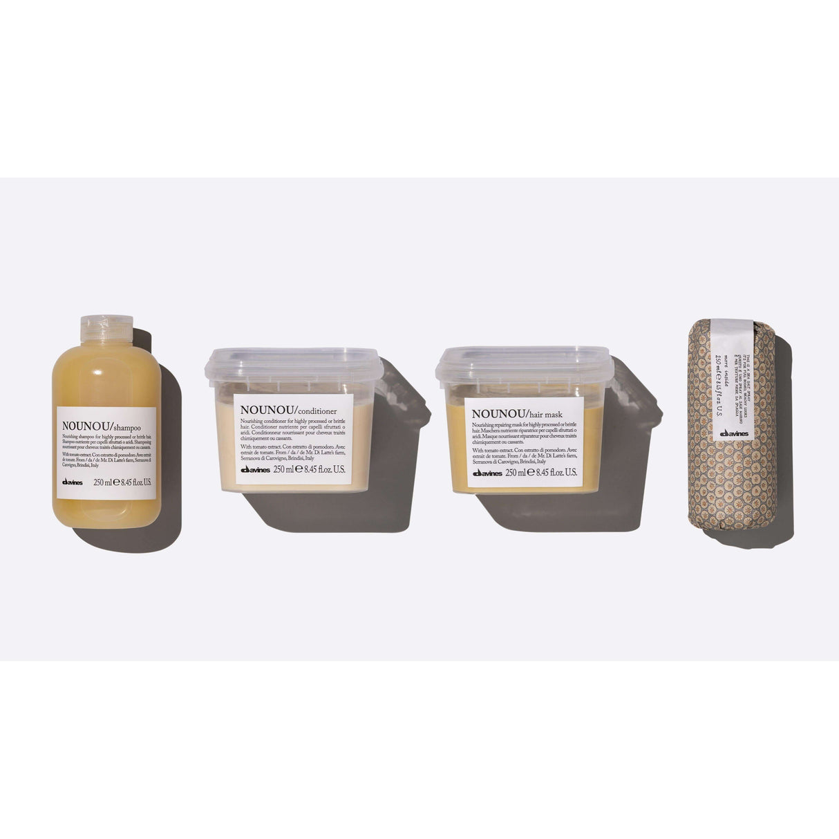 Davines Easy Beach Waves Set with Nounou Shampoo, Conditioner, Hair Mask, and Sea Salt Spray for natural, beachy hair texture.