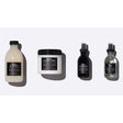 Davines Effortless Messy Waves Set including shampoo, conditioner, serum, and spray for natural textured hair.