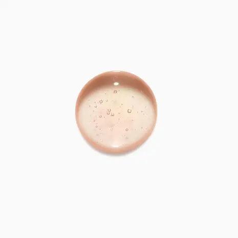 Swatch of Kerastase Elixir Ultime Hair Oil for color-treated hair, showing its rich texture and protective formula.