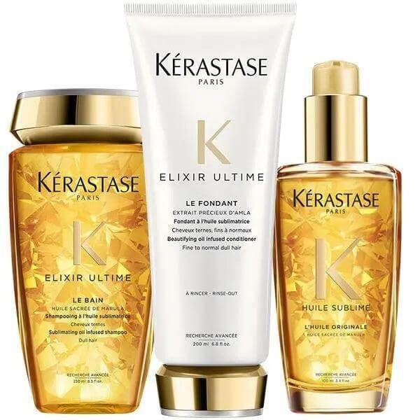 Kérastase Elixir Ultime Hair Oil Set for hydration and shine, includes shampoo, conditioner, and oil for all hair types.
