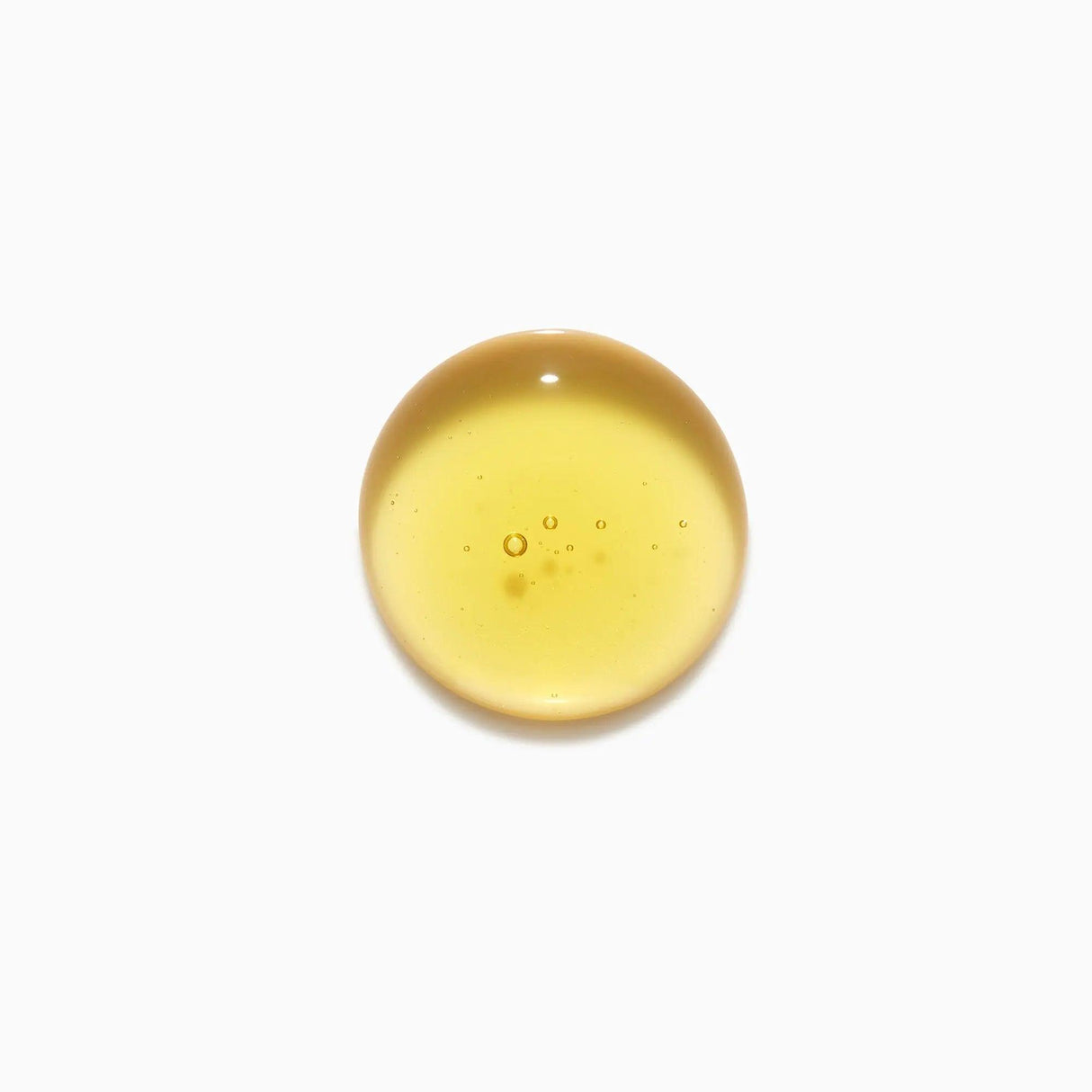 Elixir Ultime Hydrating Shampoo texture displaying its nourishing formula for shine and hydration on all hair types.