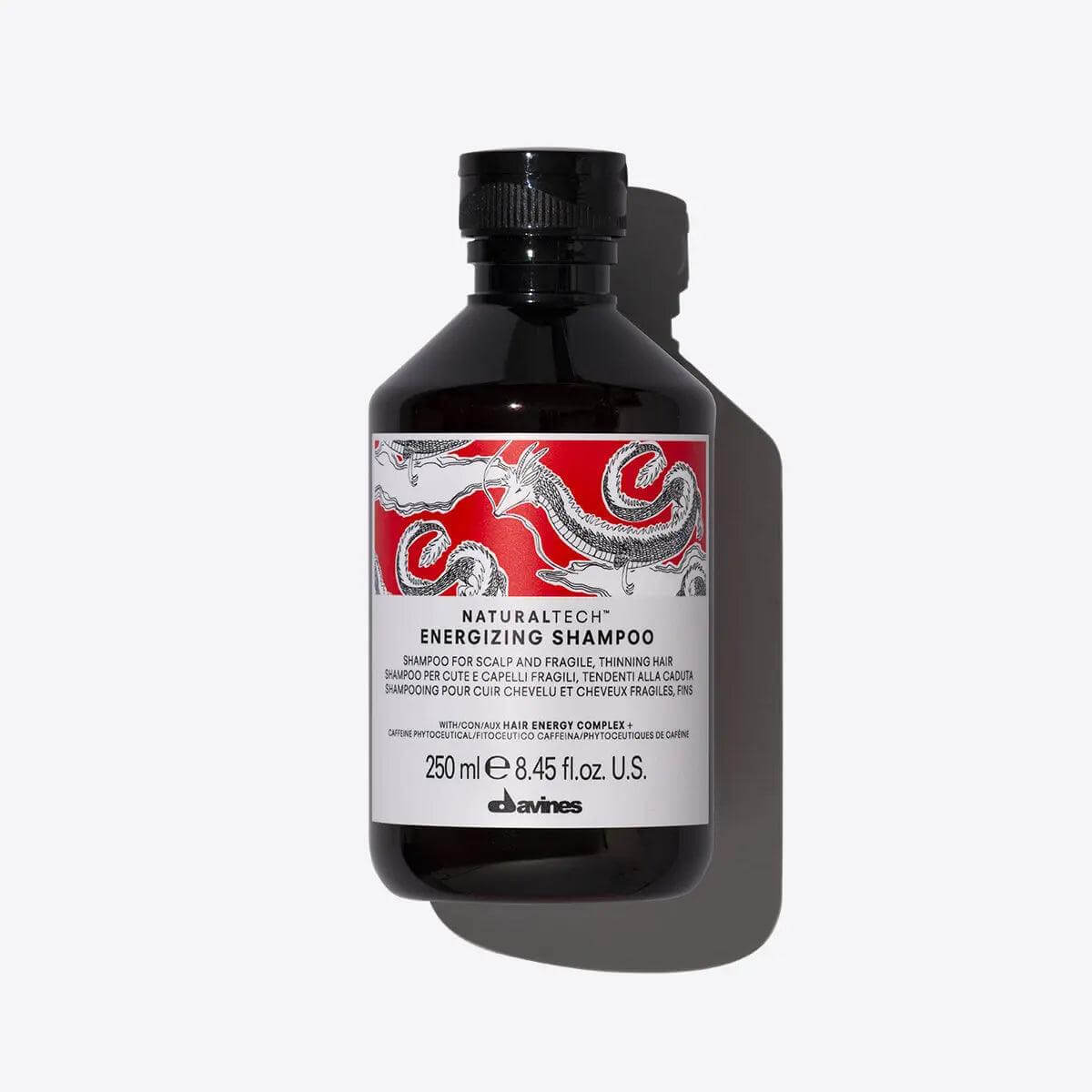 Davines Energizing Shampoo bottle, rejuvenating hair care for vitality and refreshment. Natural ingredients for healthy hair.