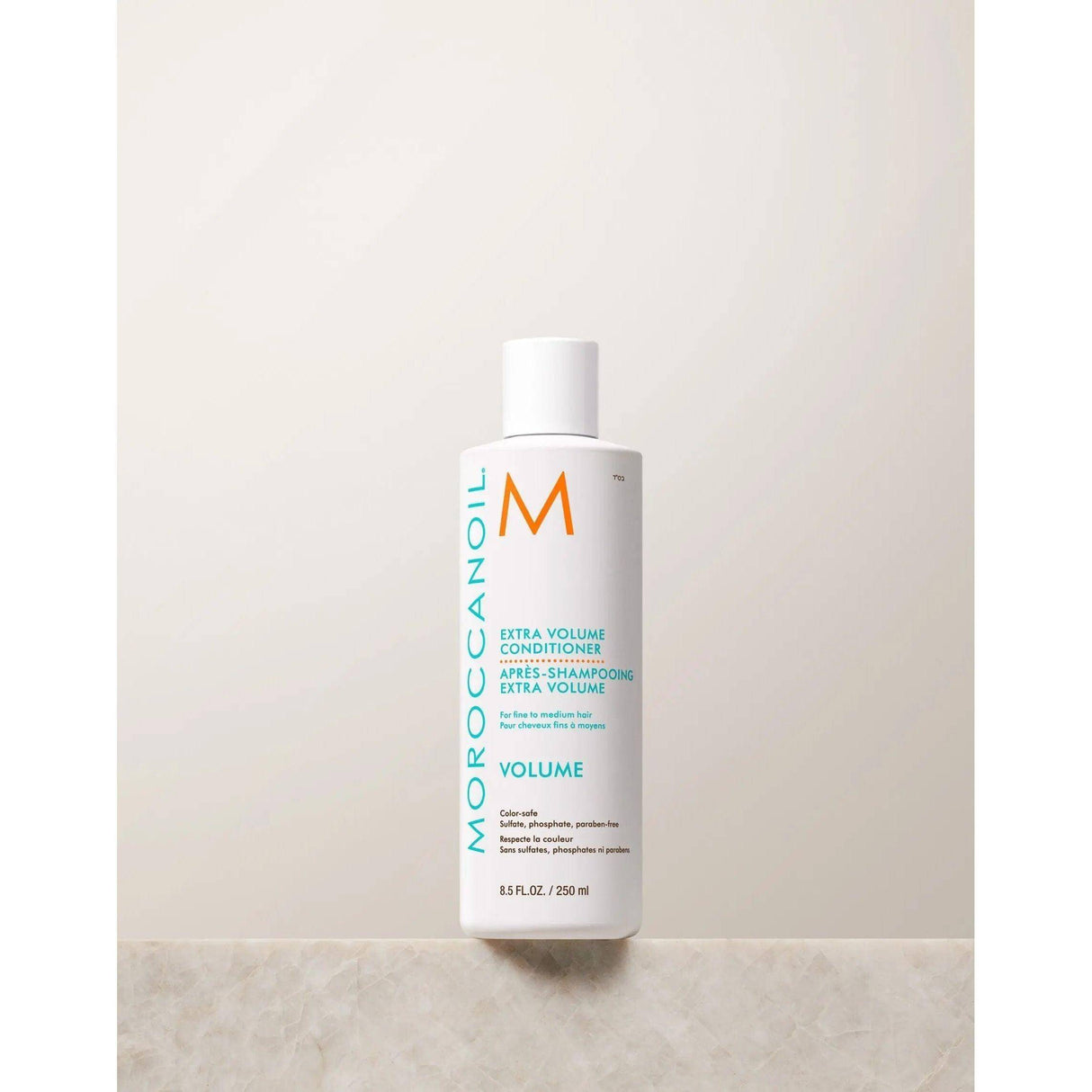 Moroccanoil Extra Volume Conditioner bottle for fine hair, enhances volume, shine, and manageability with argan oil and linden bud extract.