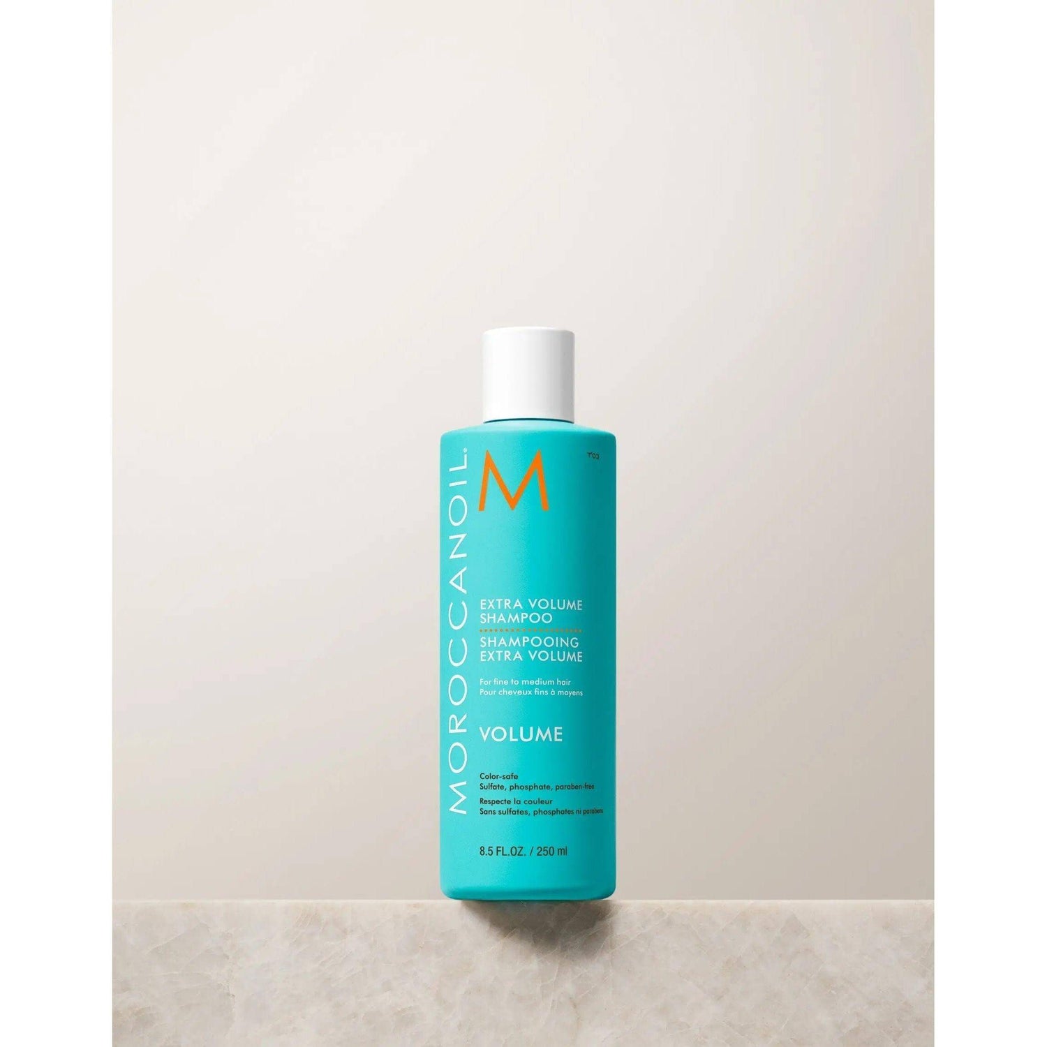 Moroccanoil Extra Volume Shampoo bottle for enhancing volume in fine hair, offering gentle cleansing and hydration.