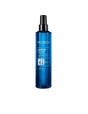 Redken Extreme Anti-Snap Treatment bottle for strengthening damaged hair and minimizing breakage, suitable for all hair types and textures.