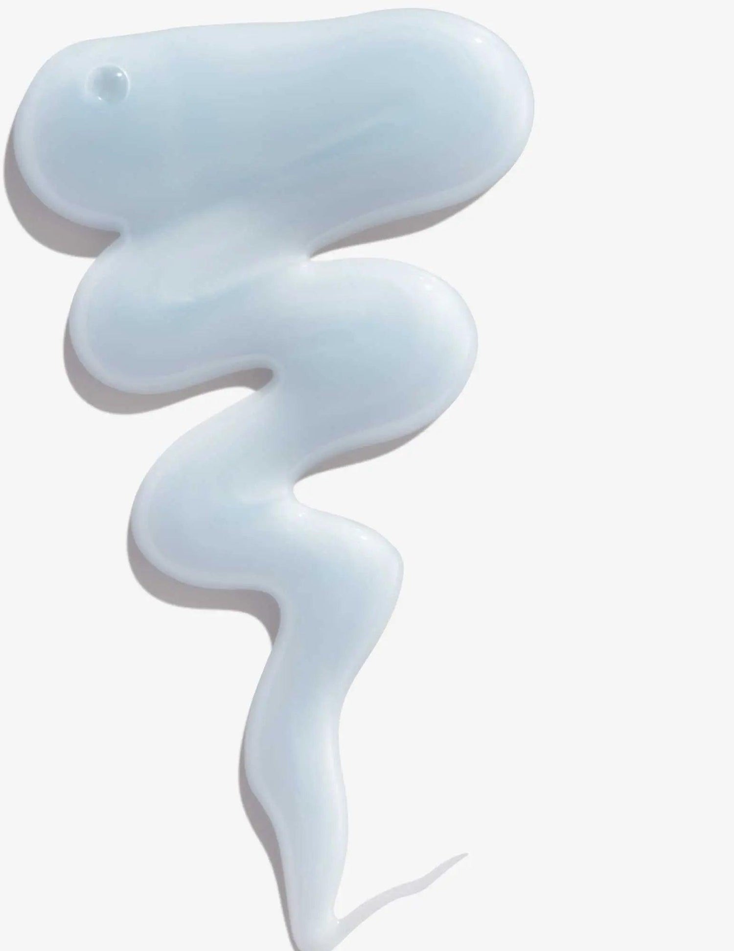 White cream-like texture of Redken Extreme Bleach Recovery Shampoo representing its nourishing formula for damaged, bleached hair.