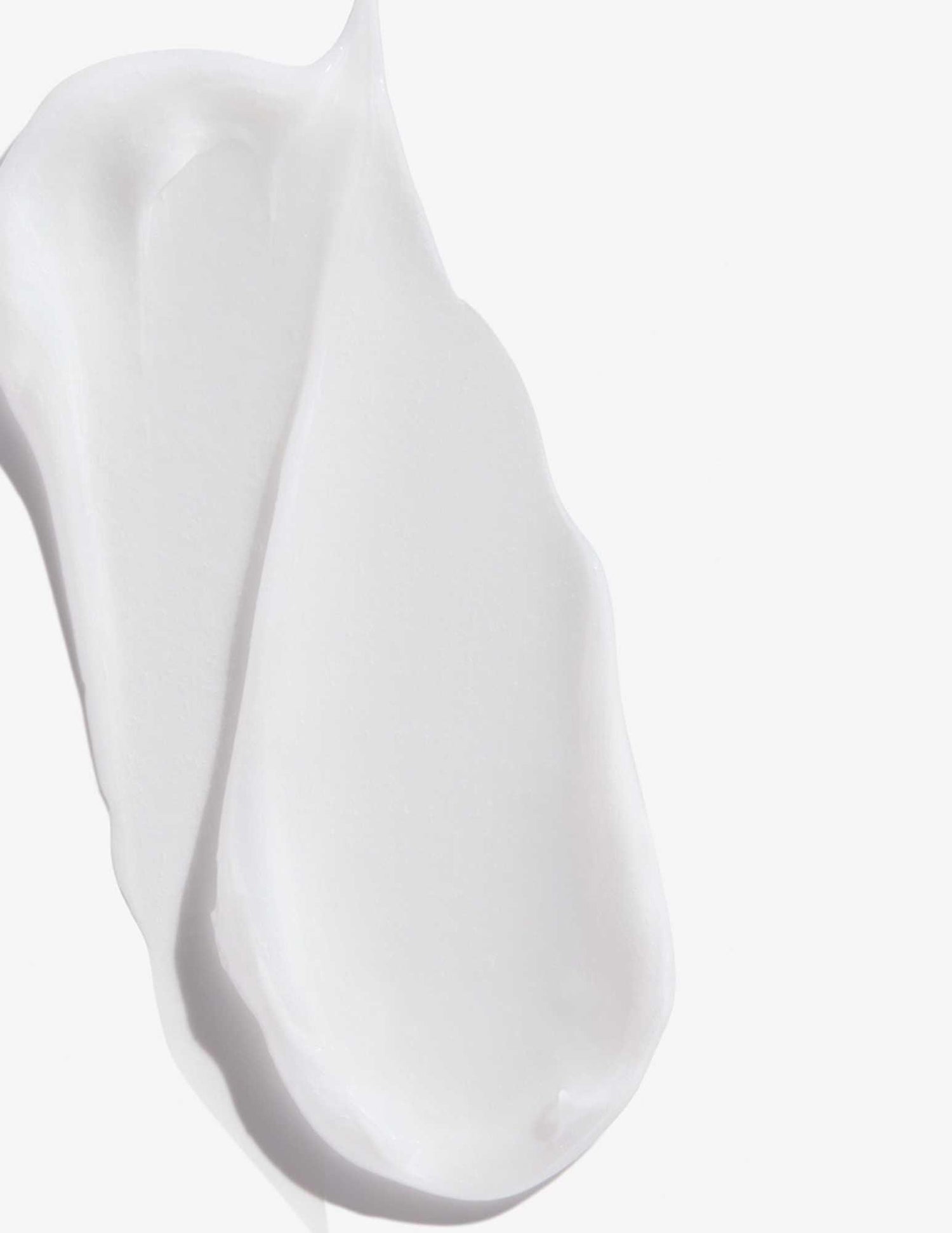Swatch of Redken Extreme Length Conditioner with creamy texture for strengthening hair.