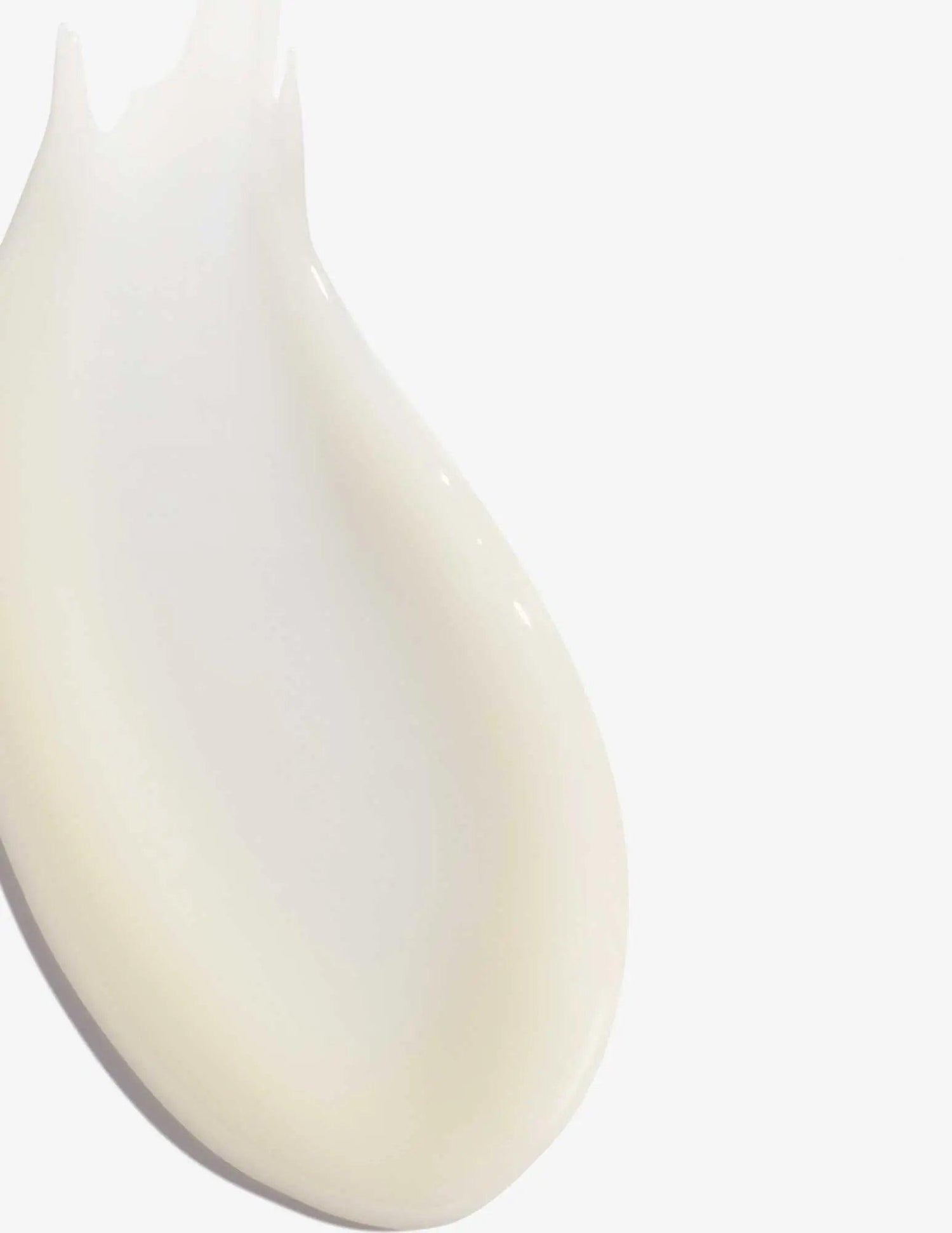Texture of Redken Extreme Length Sealer cream for strengthening hair and enhancing length.