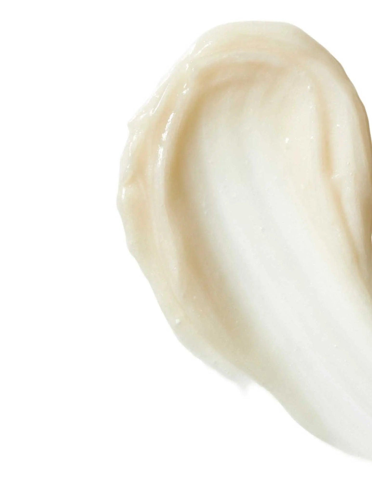 Creamy texture of Redken Extreme Length Triple Action Treatment, designed to strengthen hair and reduce breakage for longer hair.