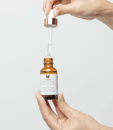Vivier Radiance Serum with dropper, featuring antioxidants for uneven skin tone and anti-aging benefits.