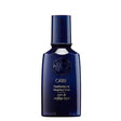 Oribe Featherbalm Weightless Styler bottle for smooth, shiny, lightweight hair control.