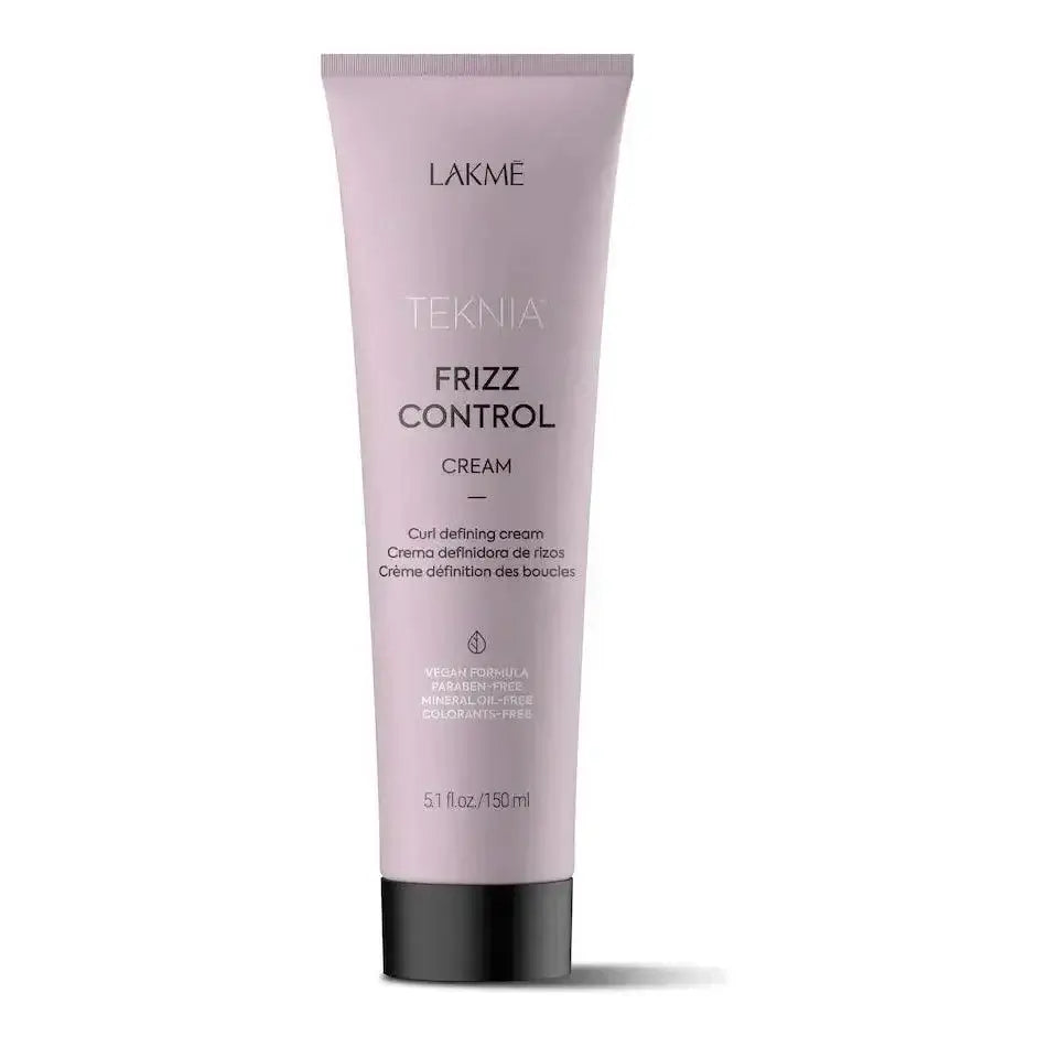 Lakme Teknia Frizz Control Cream tube for smoothing hair strands, hydrating and enhancing shine with ylang-ylang fragrance.