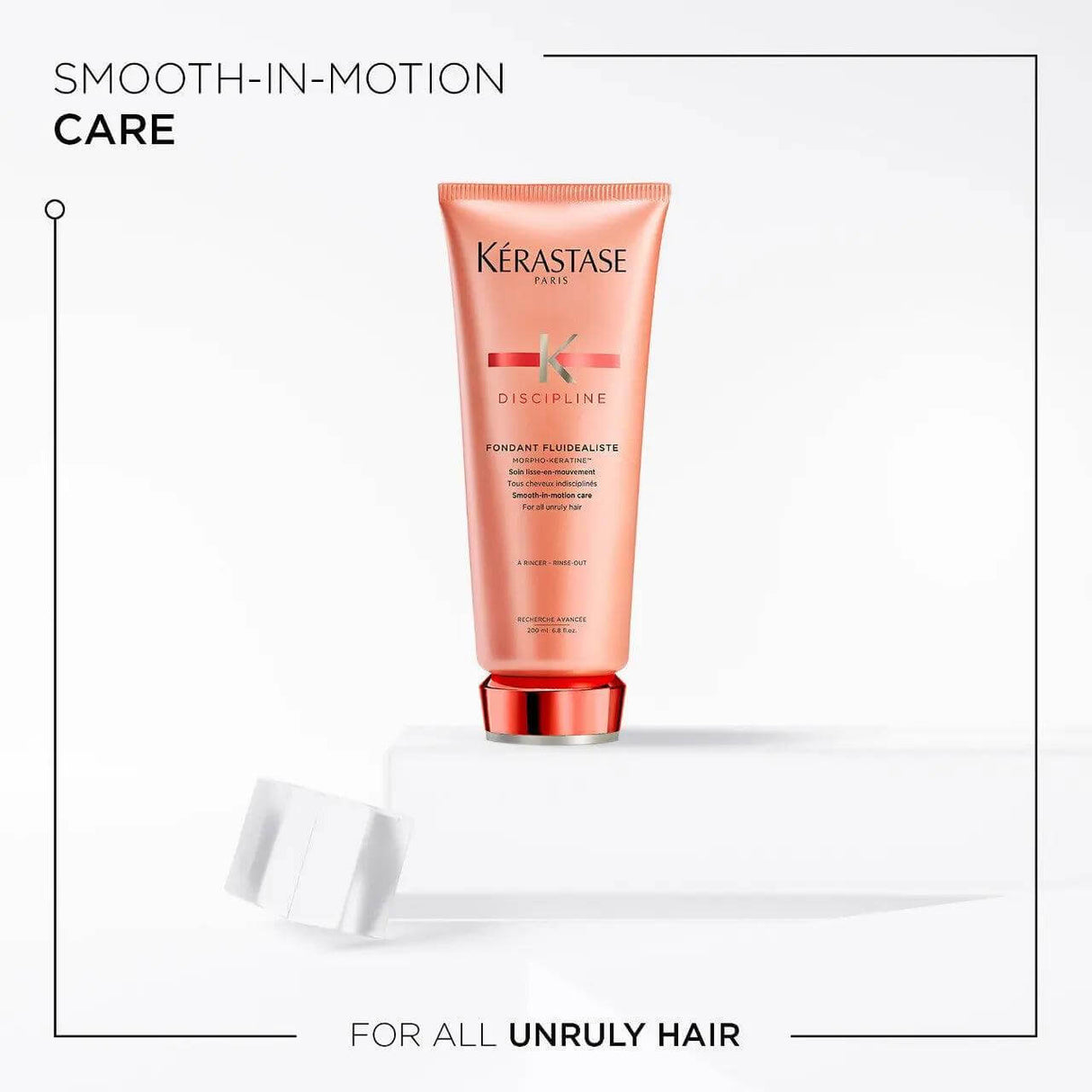 Kerastase Fondant Fluidéaliste Smoothing Conditioner for frizzy hair in a sleek bottle, ideal for all hair types.