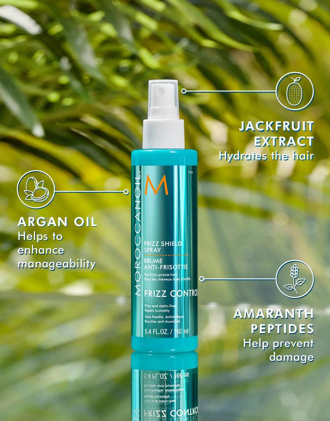 Frizz Shield Spray bottle with ingredients: argan oil for manageability, jackfruit extract for hydration, and amaranth peptides for damage prevention.