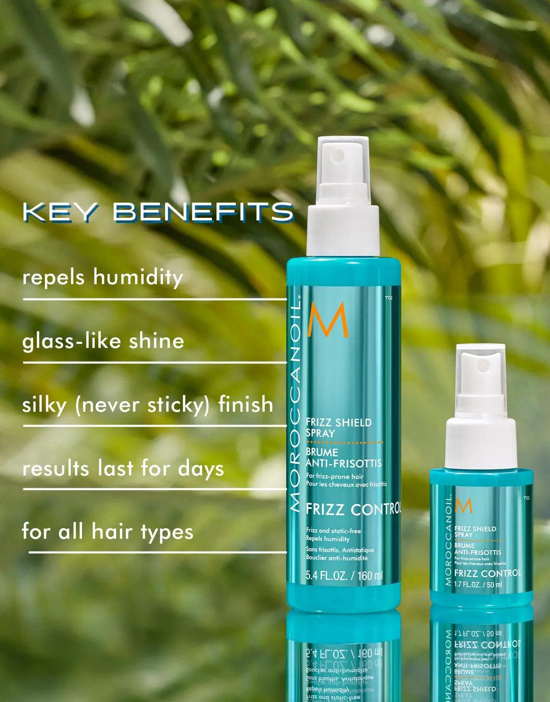 Frizz Shield Spray bottle showcases humidity repellent benefits and long-lasting frizz control for silky, shiny hair.