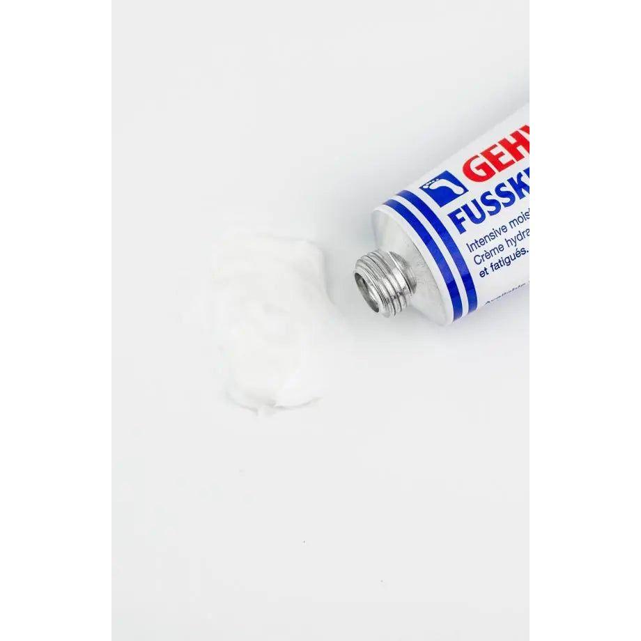 Gehwol Fusskraft Blue tube with cream for dry, rough skin care, featuring lanolin and aloe vera, on a white background.