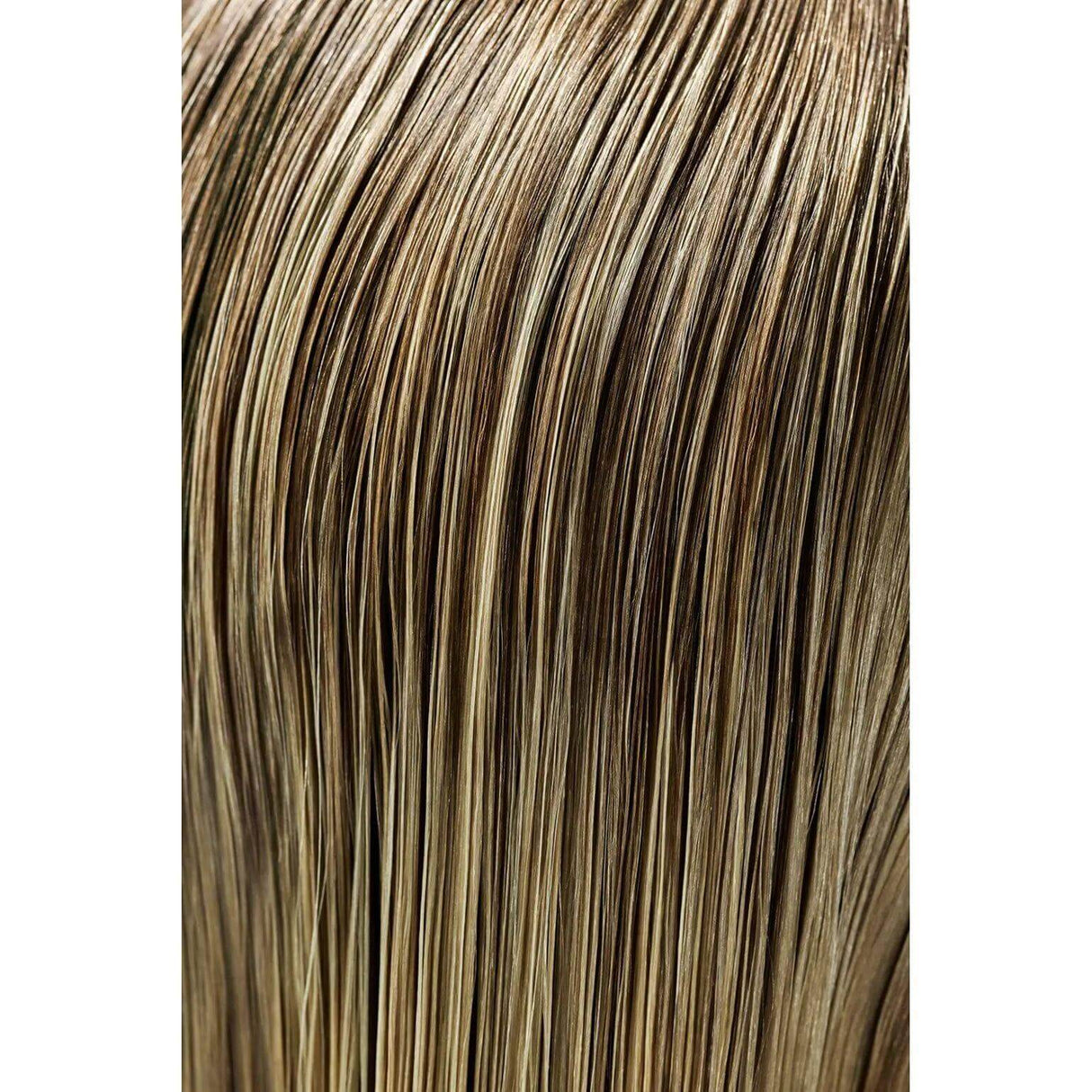 Close-up of glossy hair with flexible hold, showcasing the sleek finish and enhanced hydration provided by Gel Serum.