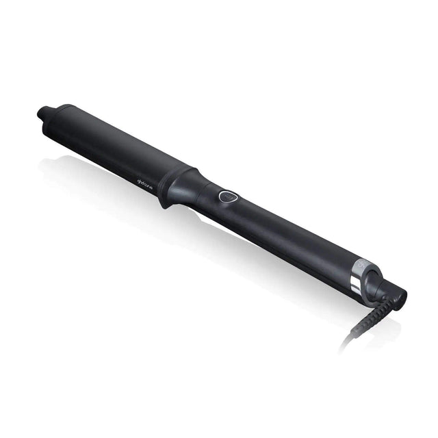 GHD Curve Classic Wave Wand with 1.5" oval barrel, featuring a protective cool tip and integrated safety stand for styling longer hair.