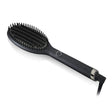 Ghd Glide Smoothing Hot Brush with ionizer-equipped ceramic technology for frizz-free, salon-smooth hair finish.