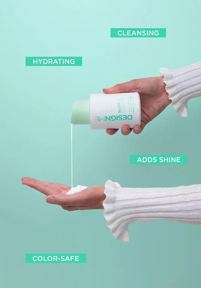 Applying DESIGN.ME hydrating shampoo for cleansing, shine, and color-safe haircare, poured onto hand for application.