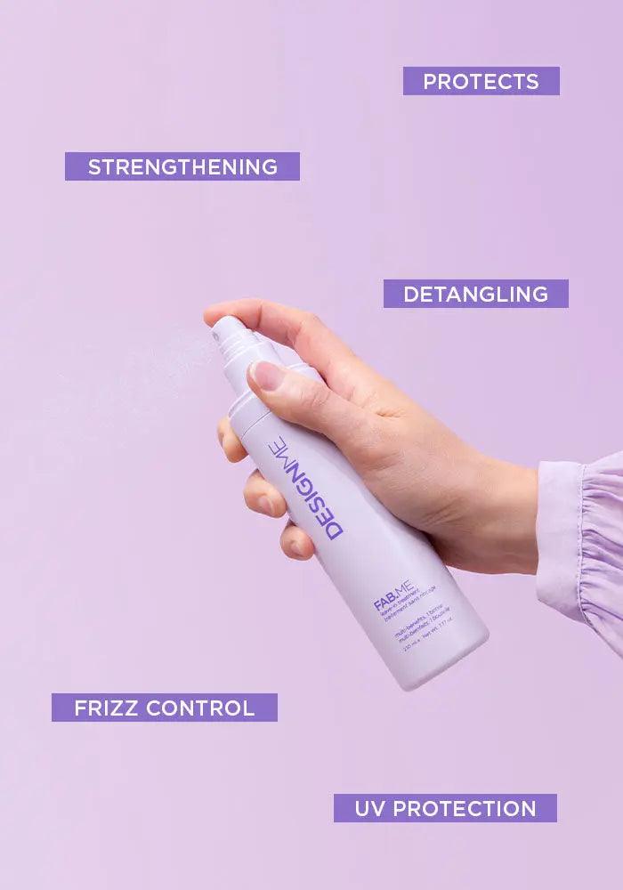 Hand holding a bottle of FAB.ME leave-in treatment with benefits: protects, strengthens, detangles, frizz control, UV protection.