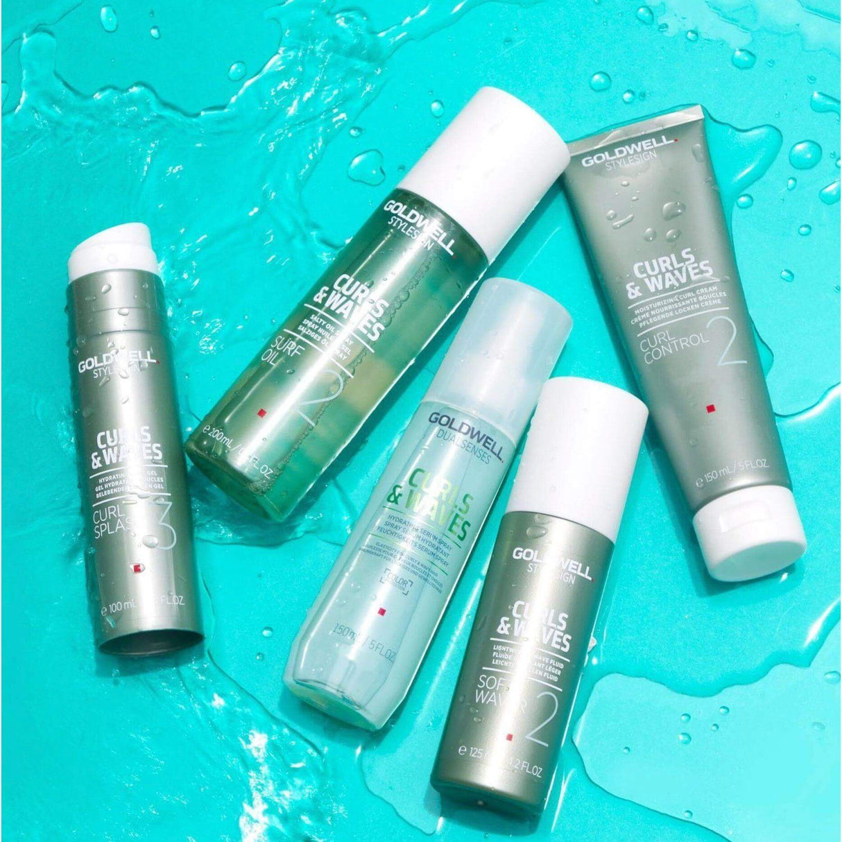 Goldwell Dualsenses Curls & Waves hair care products with hydrating serum spray on turquoise background.