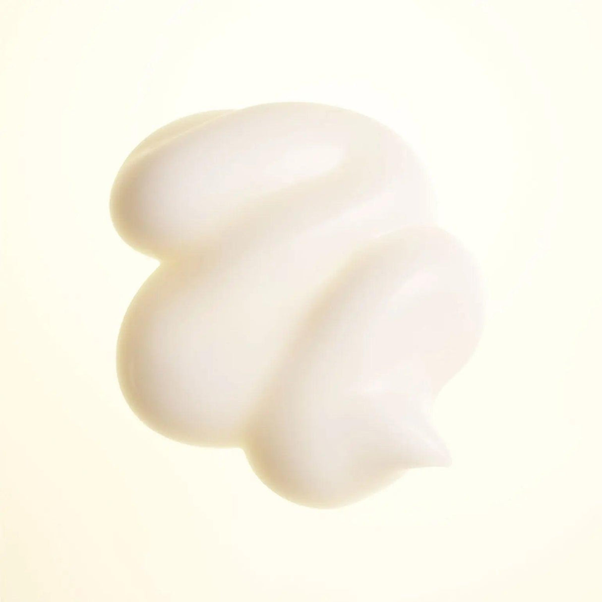 Texture of Hair Alchemy Strengthening Masque for delicate hair care and breakage prevention.