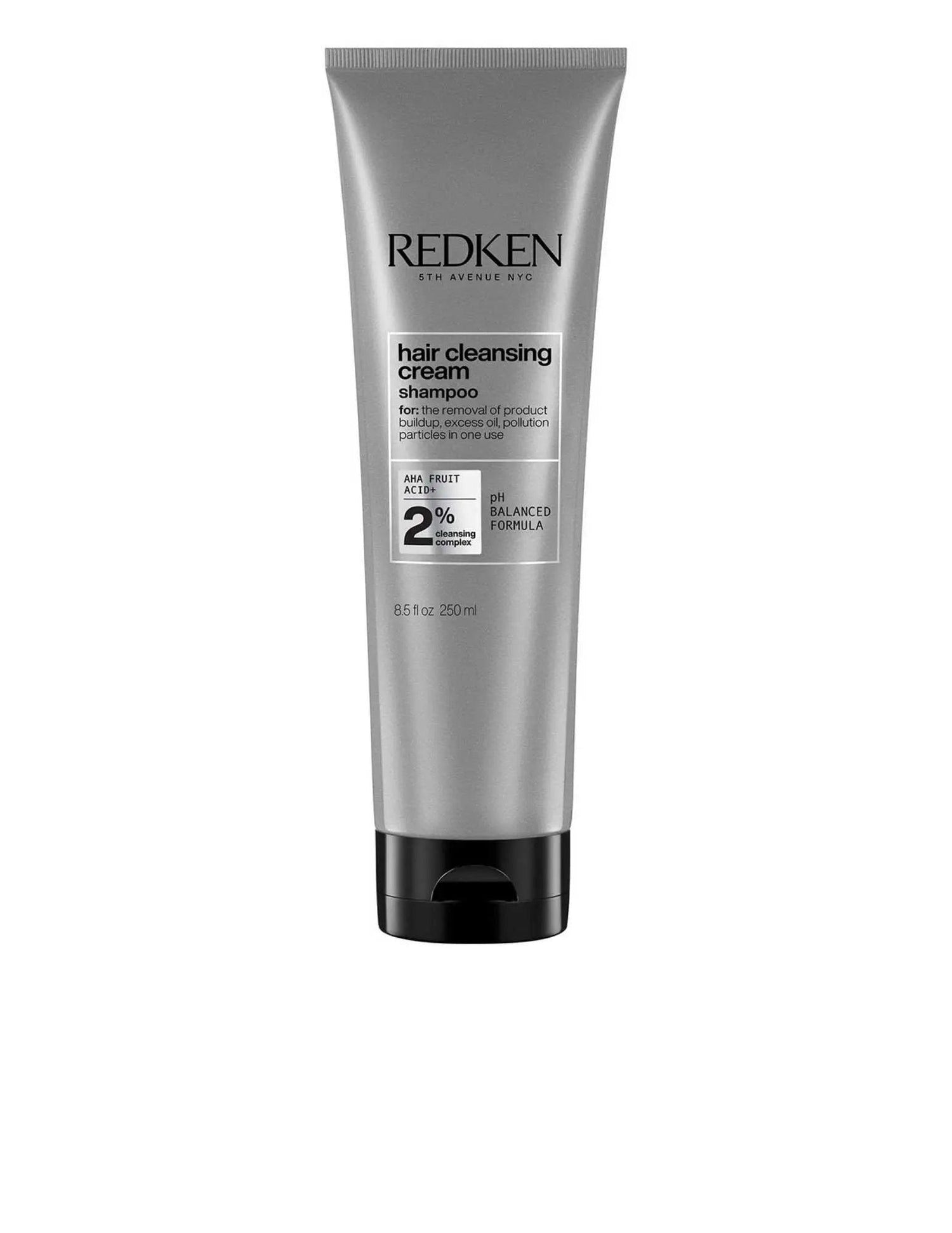 Redken Hair Cleansing Cream Shampoo tube for removing impurities and build-up, suitable for all hair types and textures.