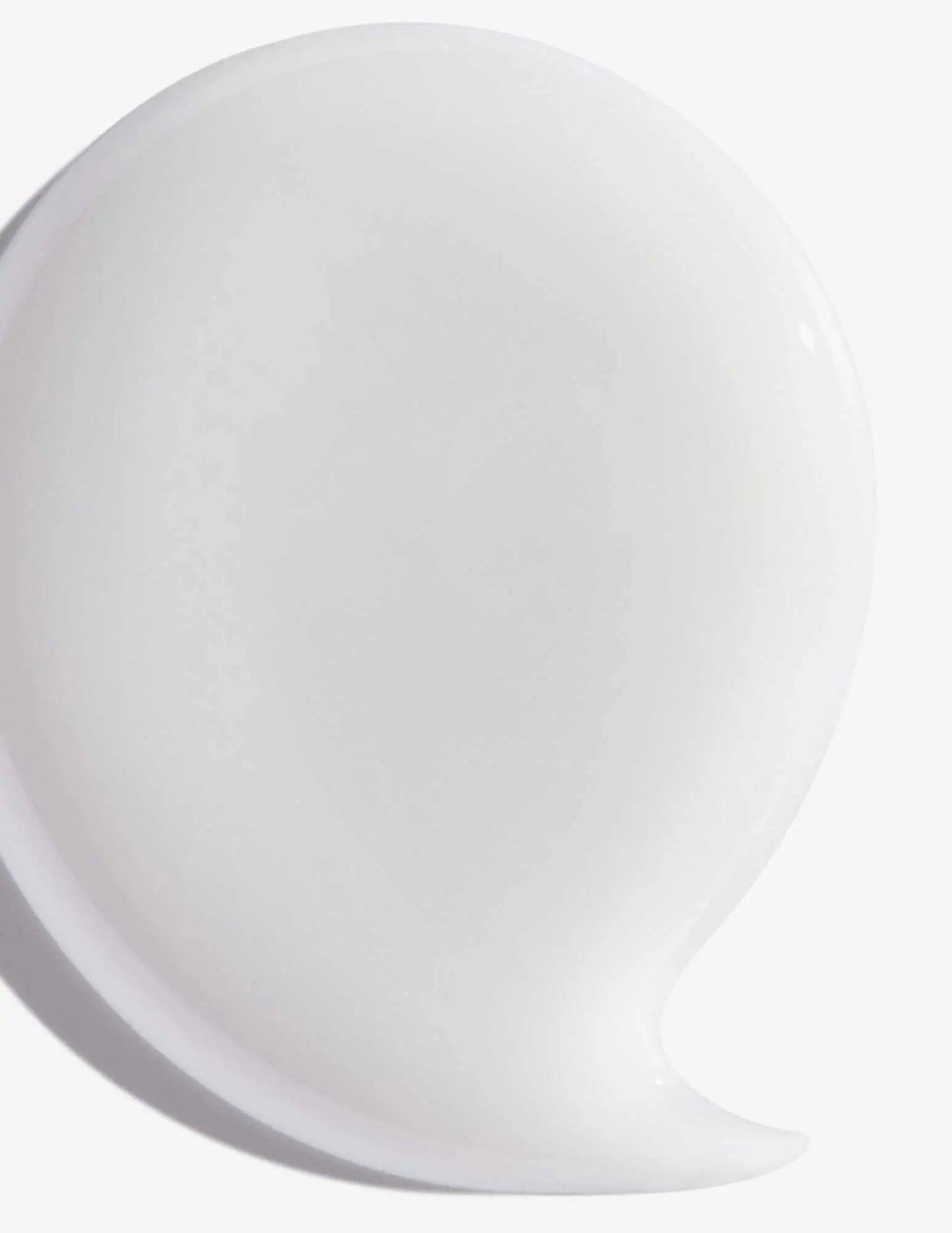 Creamy texture of Redken Hair Cleansing Cream Shampoo for eliminating hair impurities and build-up.