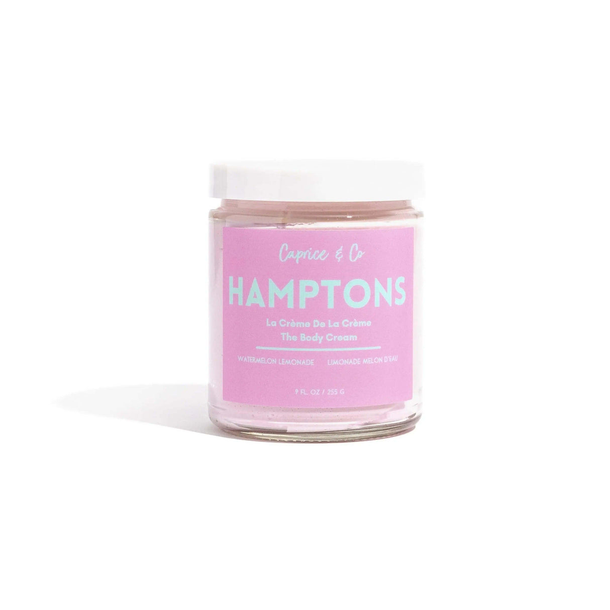 Hamptons body cream jar with watermelon lemonade scent, 9 fl oz, featuring moisturizing coconut, jojoba oil, and shea butter formula.