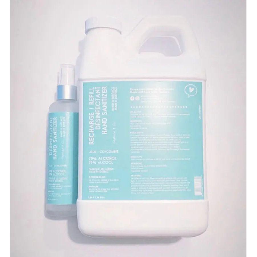Aloe cucumber hand sanitizer spray and refill bottle, Health Canada approved, 3.38 fl oz and 1-gallon sizes shown with blue labels.