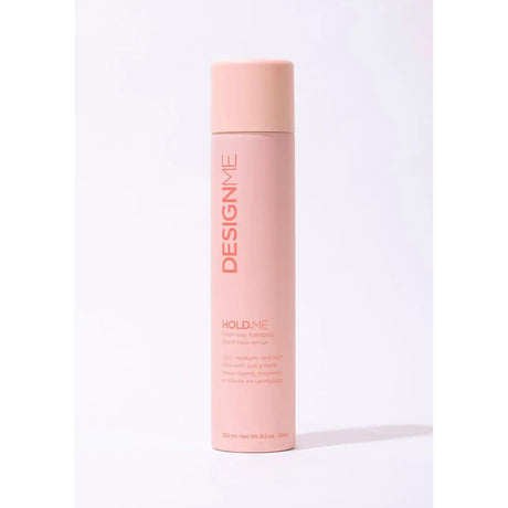 Hold.Me Three-Way Hairspray bottle offering light, medium, and high hold levels in a sleek design.