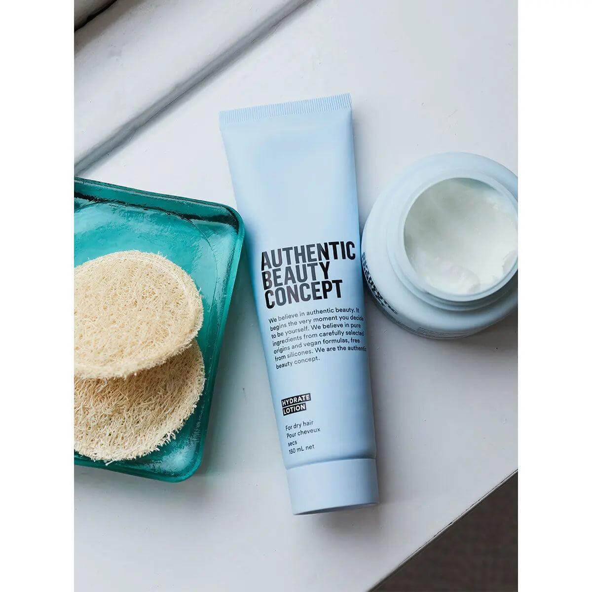 Authentic Beauty Concept Hydrate Lotion for dry hair, cruelty-free, vegan, gluten-free, enhances shine and protects during blow-dry.