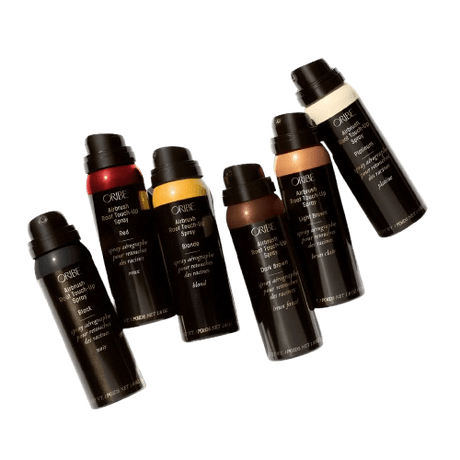 Assorted Oribe root touch-up sprays in various colors, perfect for concealing roots and enhancing hair color.